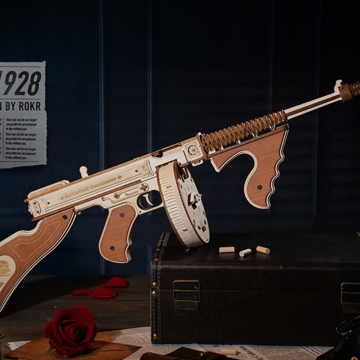 Wooden model gun with brown and beige details on a dark background