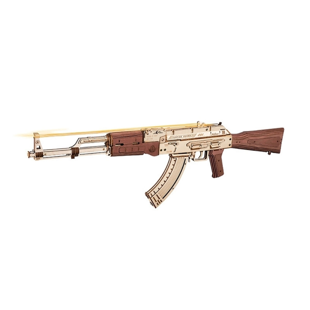 Decorative rifle with gold accents on a white background
