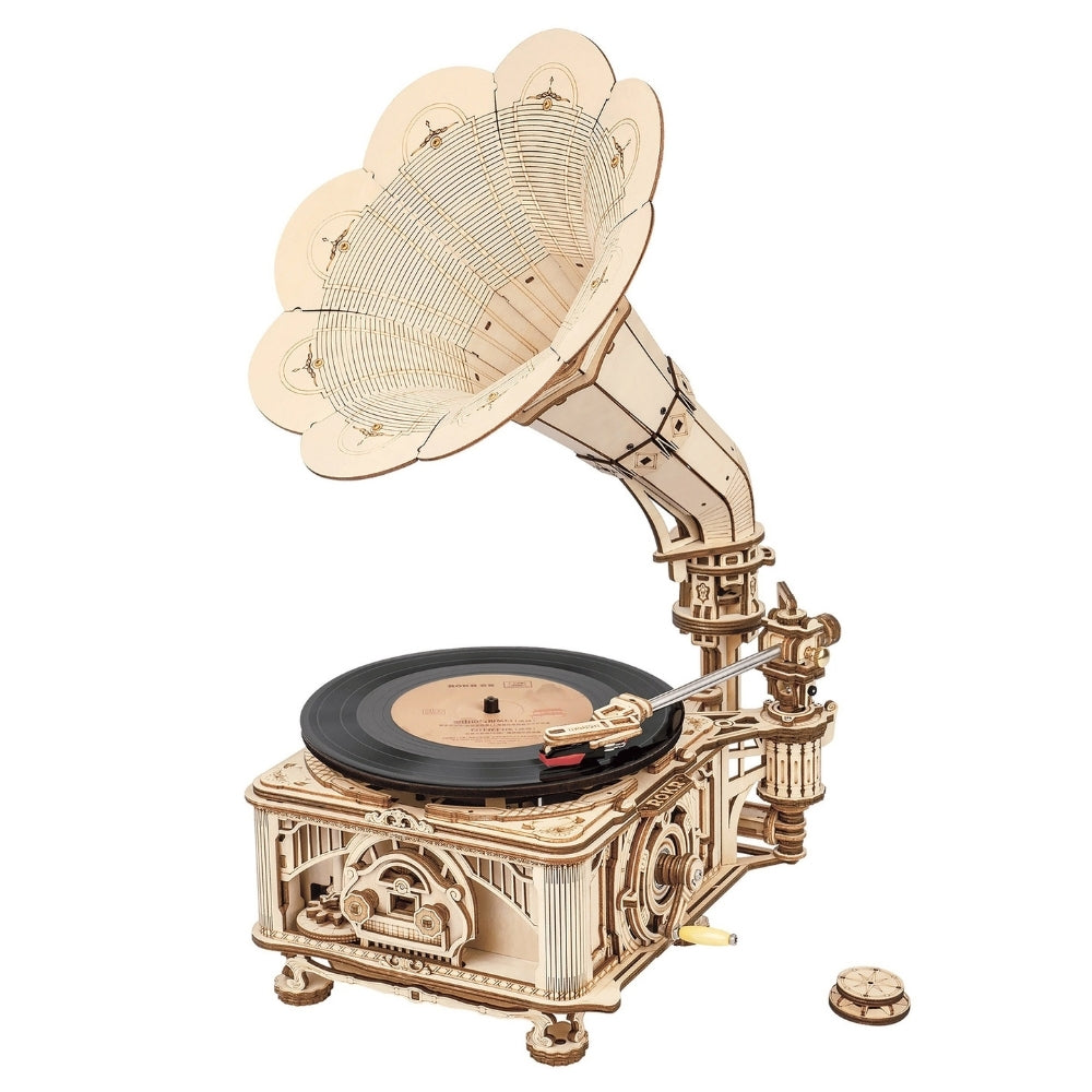 Wooden model of a vintage gramophone on a white background